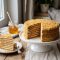 Medovik – Russian Honey Cake with Sour Cream Frosting
