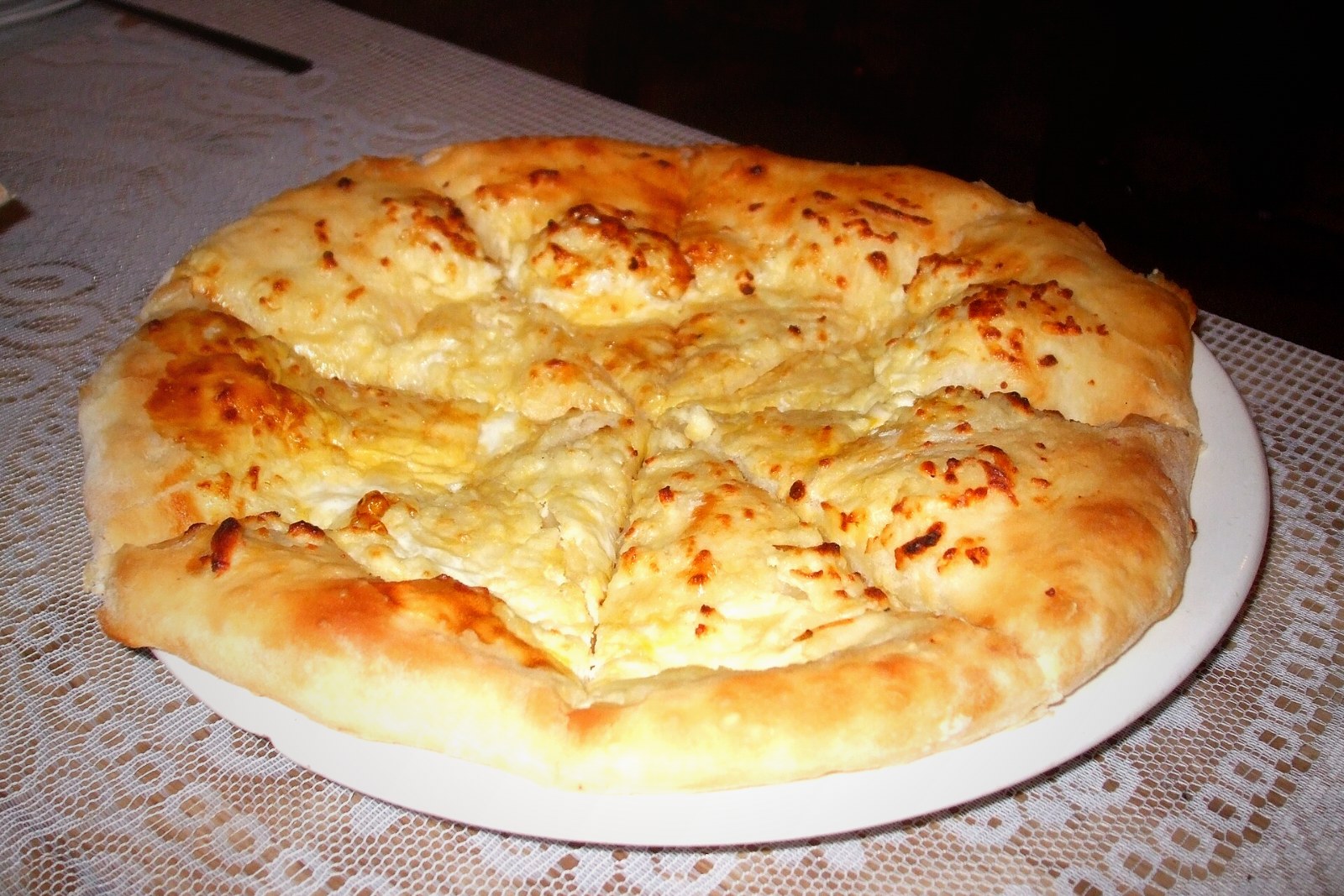 Megruli khachapuri – Georgian cheese bread