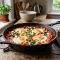 Shakshuka – Eggs Poached in Spiced Tomato and Pepper Sauce